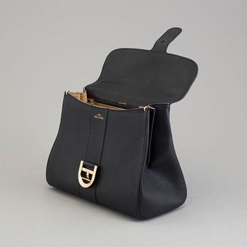 A Delvaux "Brillant" ladies handbag in black colored leather.