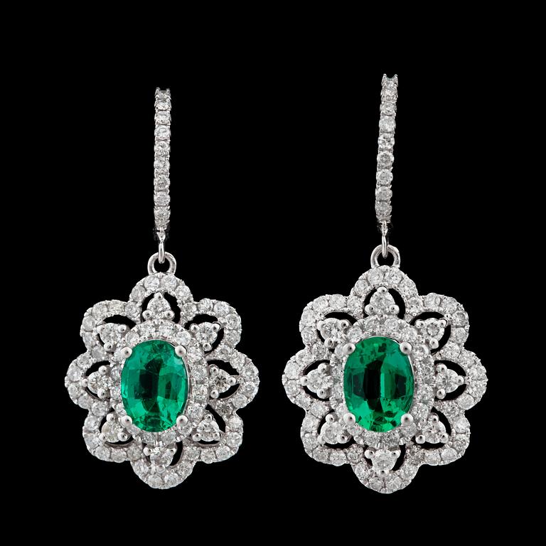 A pair of emerald, 1.54 cts, and brilliant 1.37 cts, earrings.