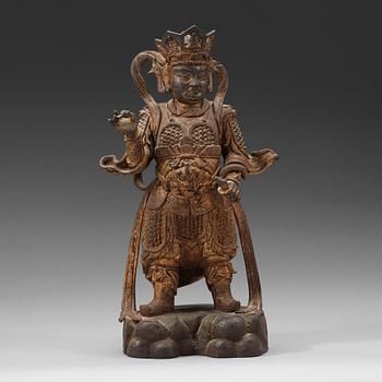 379. A large bronze figure of the Guardian King of the West, Ming dynasty (1368-1644).