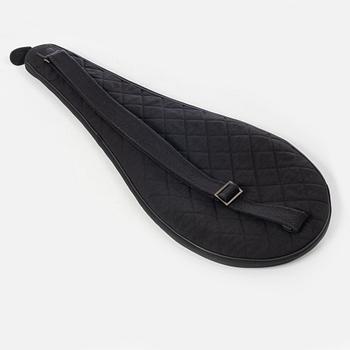 Chanel, tennis racket and 4 balls with case.