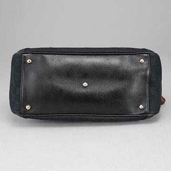 GUCCI, 'GG Canvas Horsebit Wave Handbag'.