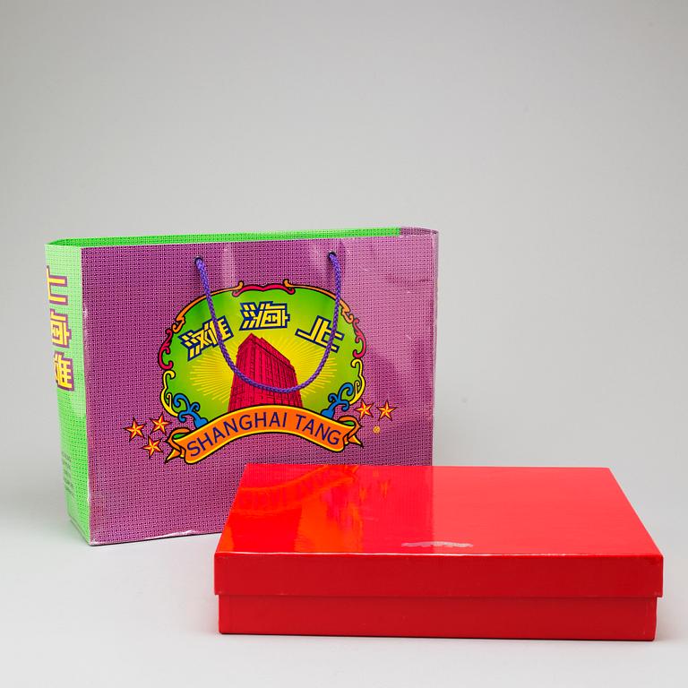 A Shanghai Tang bag.