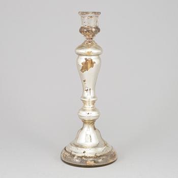 A 19th century glass candlestick.