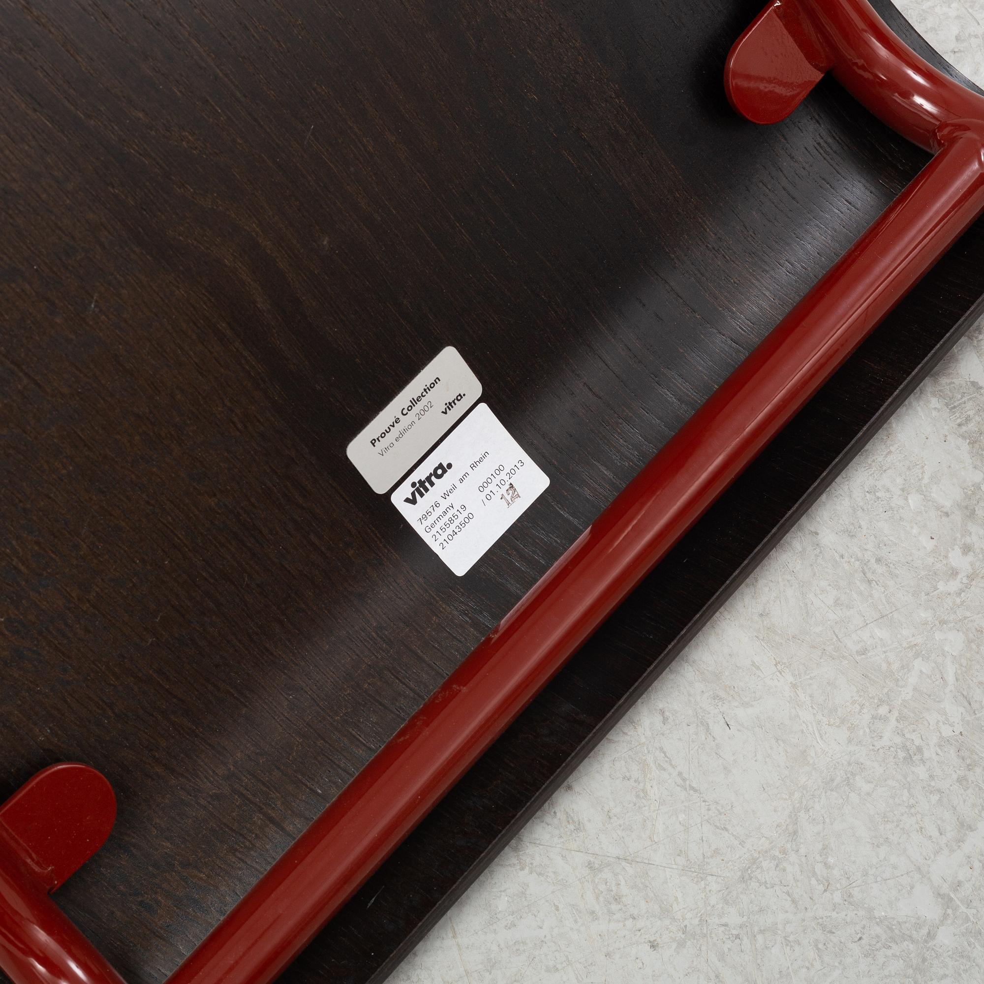 A Standard chair by Jean Prouvé for Vitra, dated 2002.