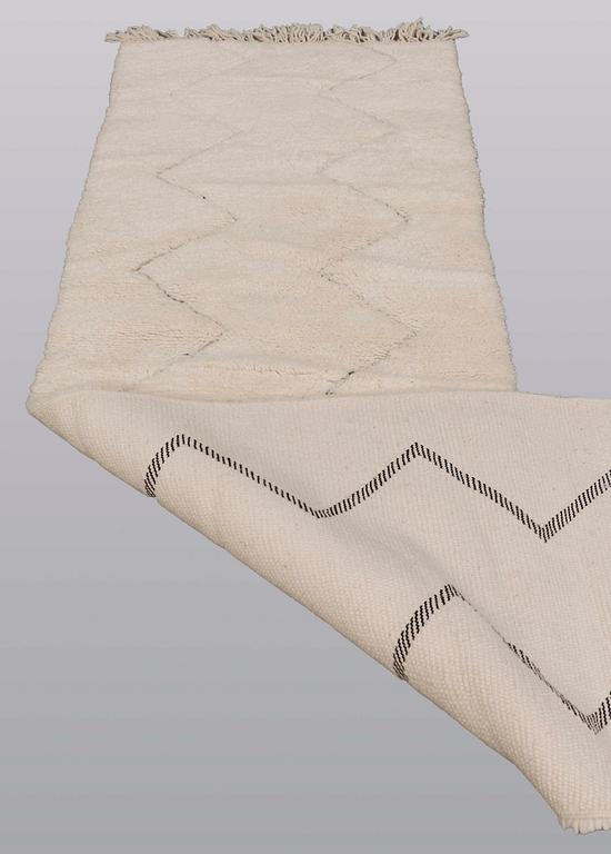A Moroccan runner carpet, 290 x 70 cm.