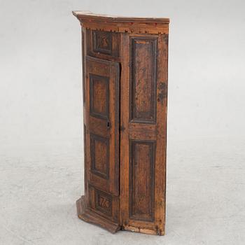 A Swedish provincial corner cabinet, 18th century.