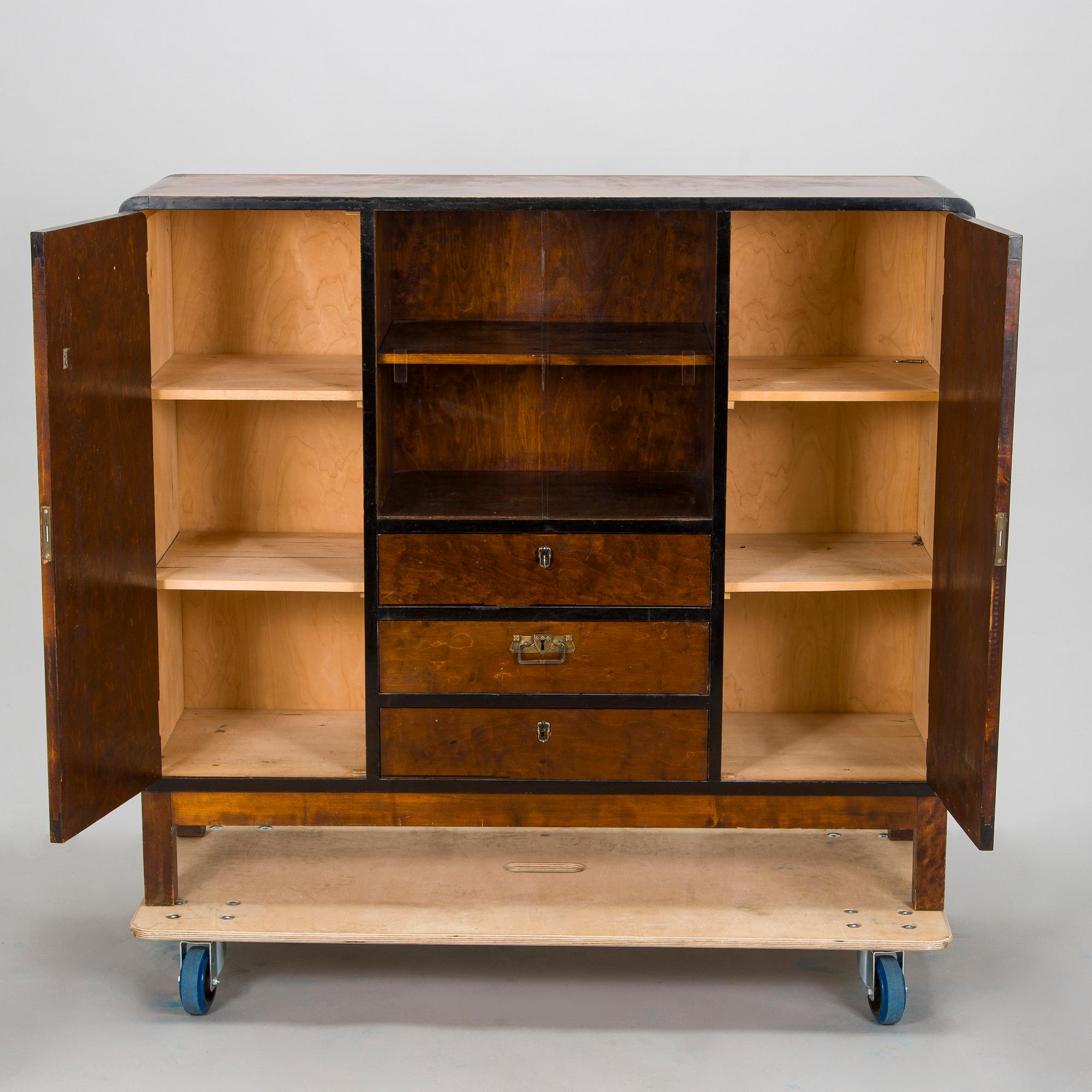 A 1930s functionalist style cabinet.
