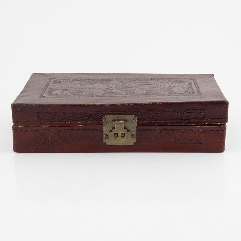 A Chinese leather box, late Qing dynasty.