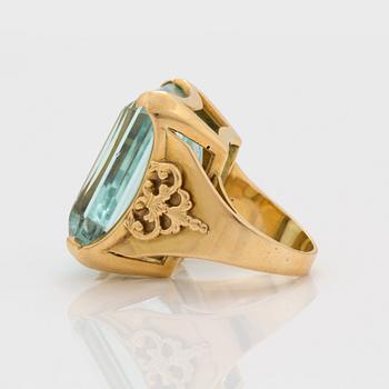 A circa 45.00 ct step cut aquamarine ring.