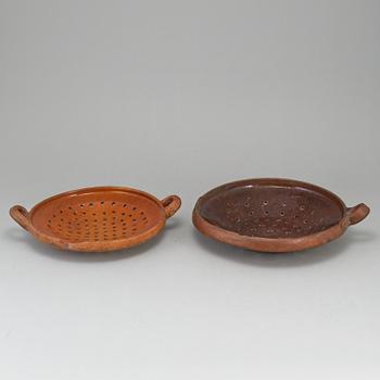 Two pottery strainers, 19th Century, Sweden.