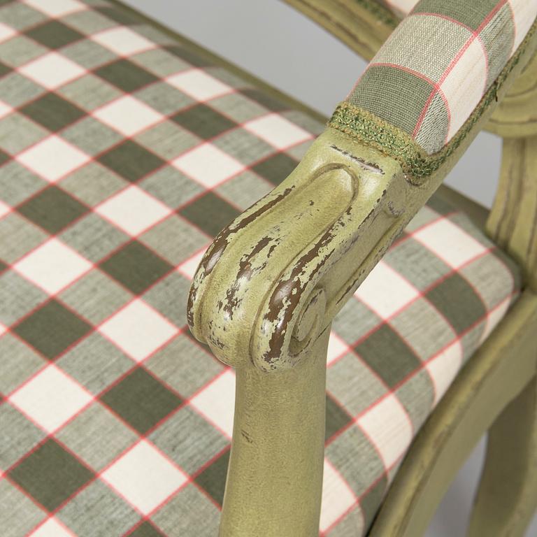 A pair of 20th century  Rococo style armchairs.