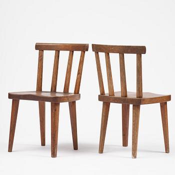 Axel Einar Hjorth, a set of four stained pine "Utö" chairs, Nordiska Kompaniet, Sweden, 1930s.