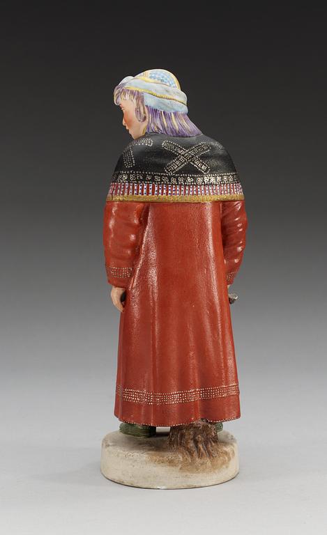 A Russian bisquit figure depicting a Khanty woman, Gardner ca 1924.