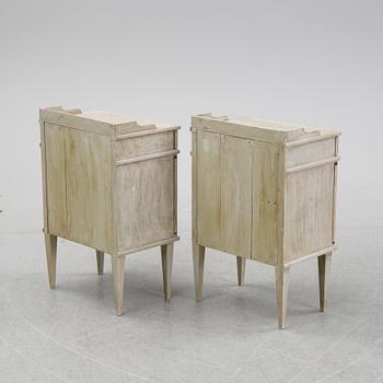 A pair of Gustavian style bedside tables, first half of the 20th century,.