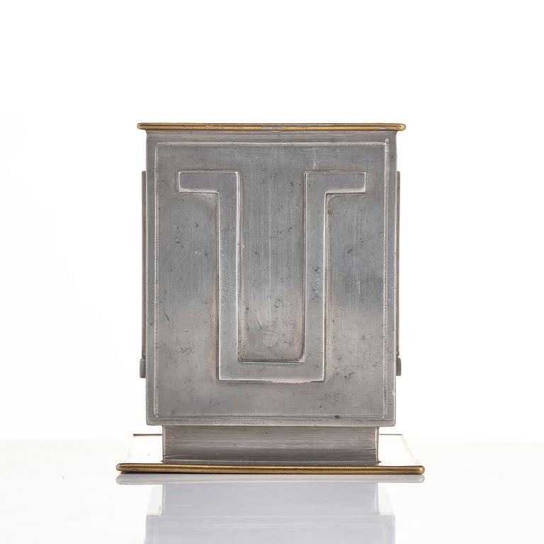 Nils Fougstedt, pennkopp, tenn och mässing, modell A 503, Firma Svenskt Tenn, Stockholm, 1932.