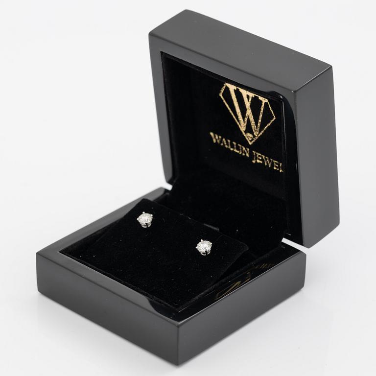 Earrings, a pair, 18K white gold set with round brilliant-cut diamonds totalling 1.03 ct, accompanied by a GIA dossier.