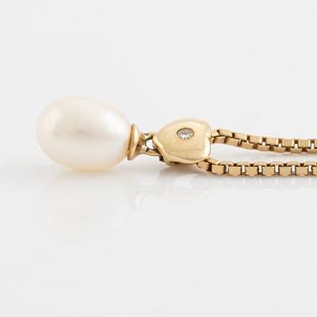 Cultured pearl and heart with small brilliant cut diamond necklace.