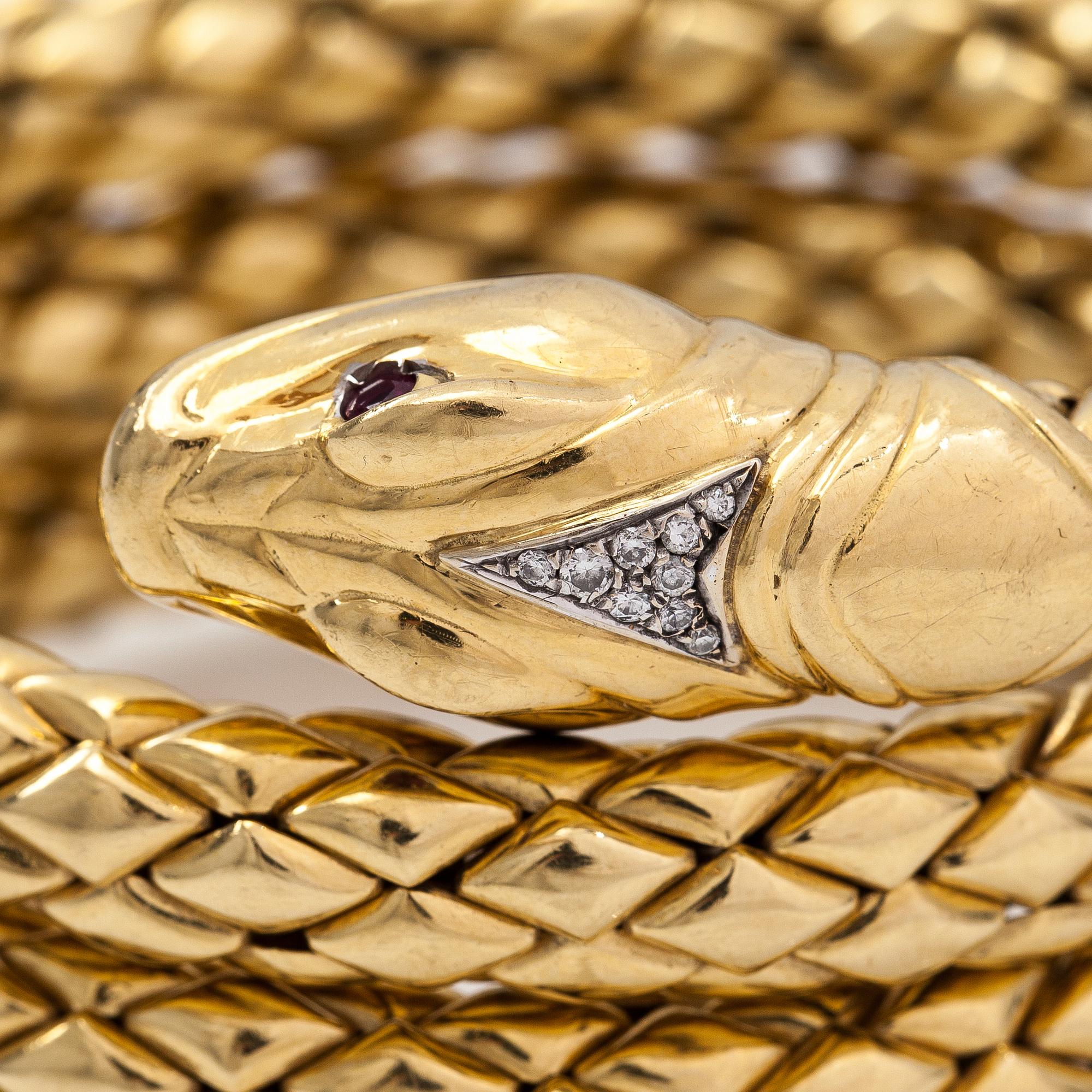 Chimento, An 18K gold snake bracelet with rubies and diamonds ca. 0.46 t in total. Italy.