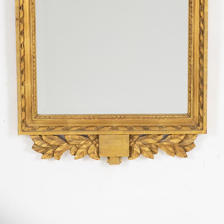 A Gustavian style mirror, 1946.
