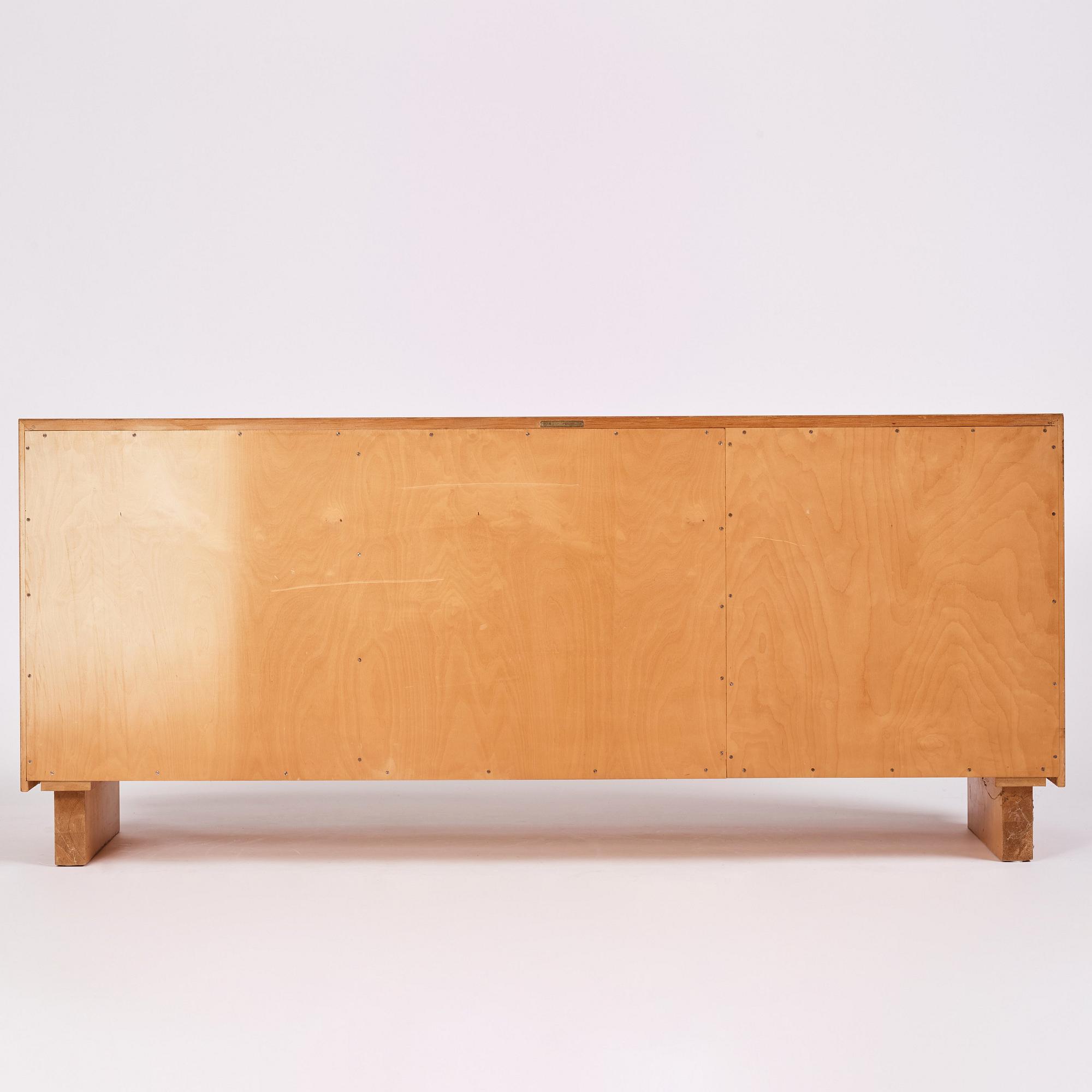 Axel Einar Hjorth, an olive ash wood and maple sideboard, 'Birka', Nordiska Kompaniet, Sweden ca 1935.