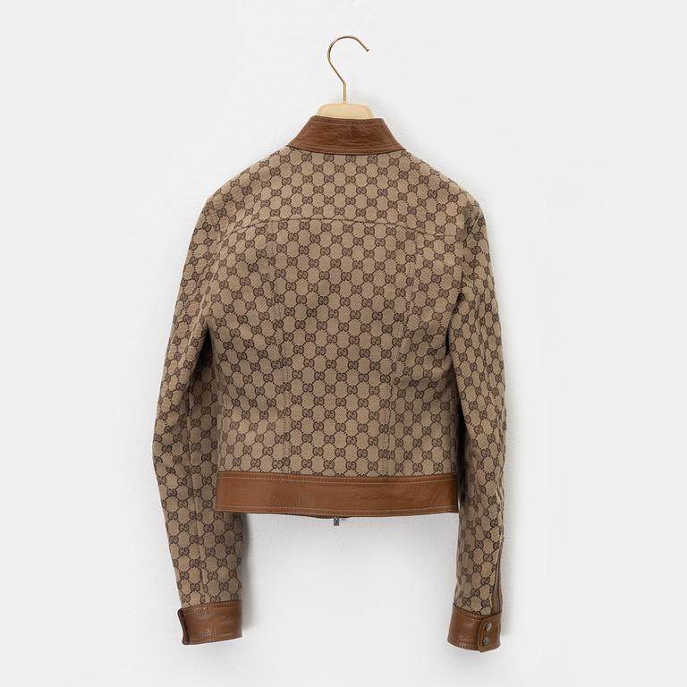 Gucci, a GG supreme jacket and shorts, size 38, 2000.