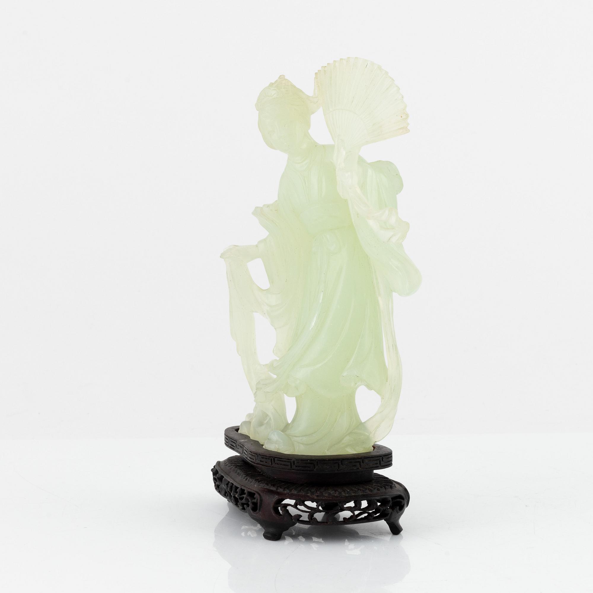 A Chinese stone scultpure of an elgegant lady, 20th Century.