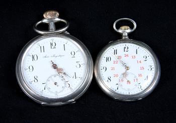 FICKUR, 2 st, låghaltigt silver, "Remontoir Ancre" samt "International Watch Co Schaffahusen". 1900-tal.