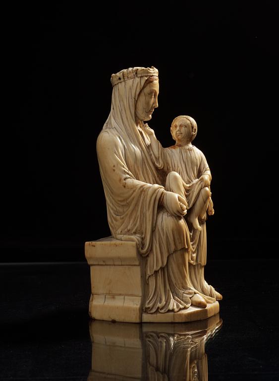 Virgin and Child, a French Gothic ivory statuette, second half of the 13th century.