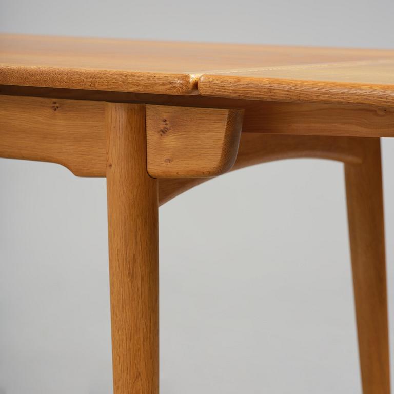 Hans J. Wegner, an "AT-312" dining table, Andreas Tuck, Denmark, 1950s-60s.