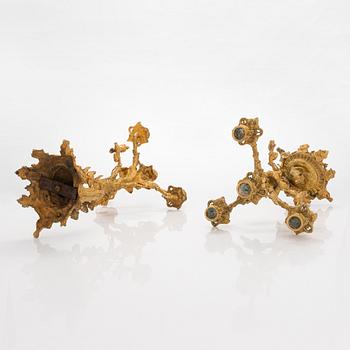 A pair of gilt brass candelabra from the latter half of the 19th century.