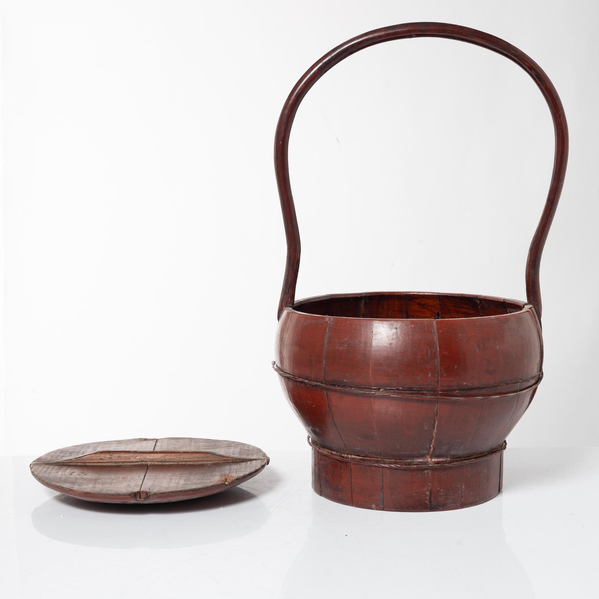 A group of three red wooden vessels, China/Southeast Asia, 20th century.