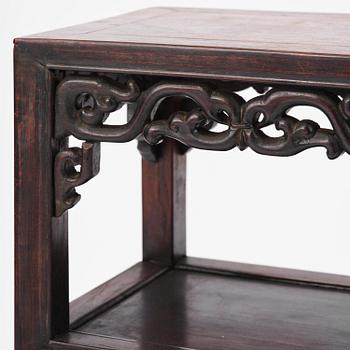 A set of two Chinese hardwood stands/tables, late Qing dynasty.