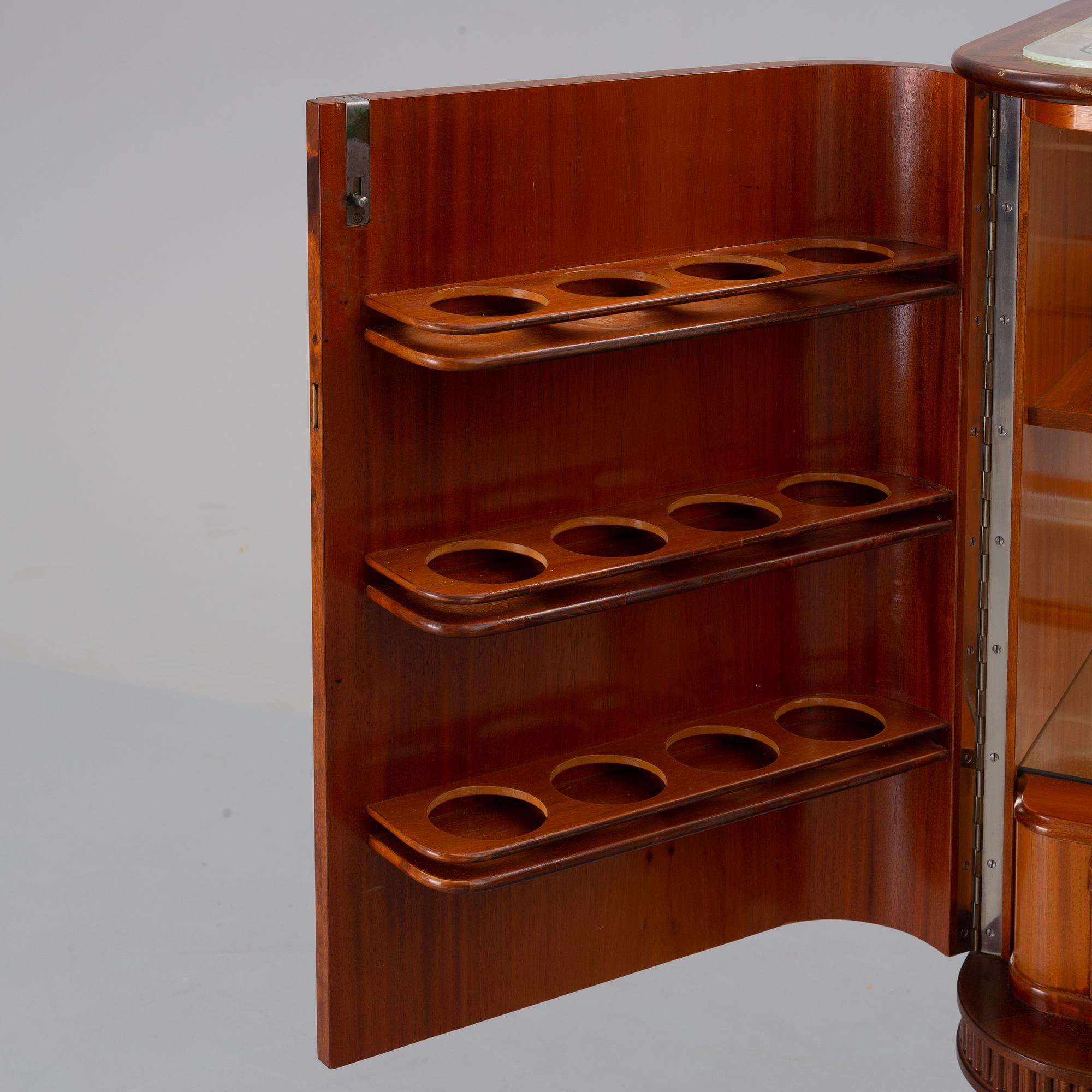 A mid 20th century drinking cabinet.