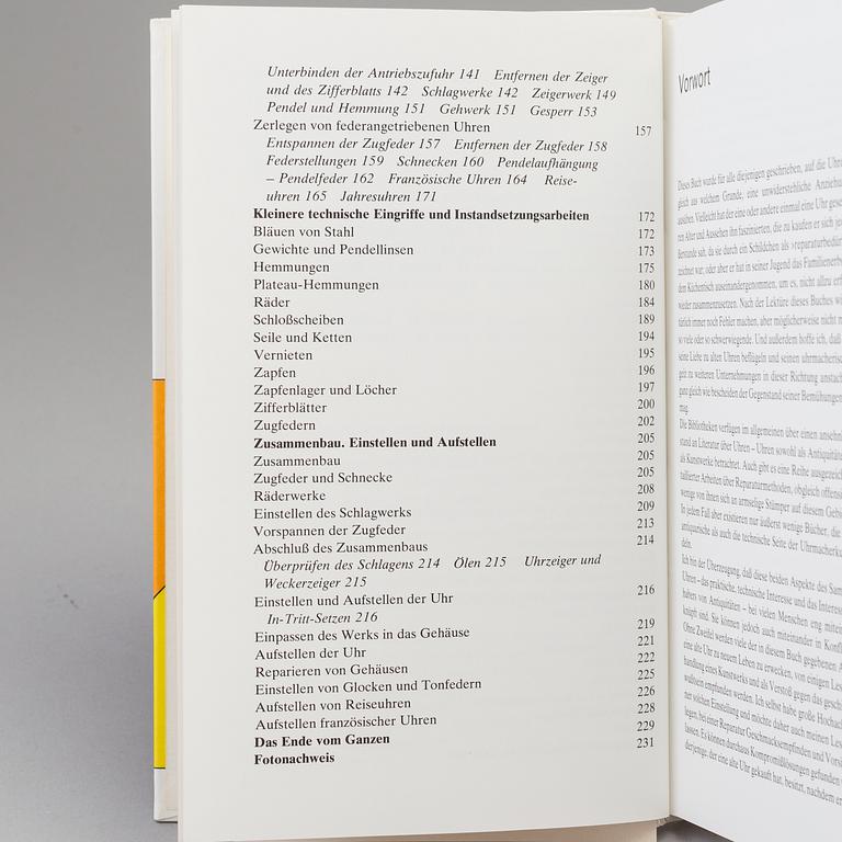 A set of 6 watch books.