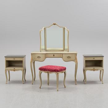 A mid 20th century Rococo style dressing table, a pair of bedside tables and one stool.