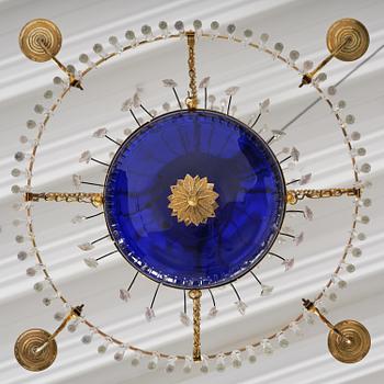 A late Gustavian five-light gilt brass and cut glass chandelier, Stockholm, late 18th century.