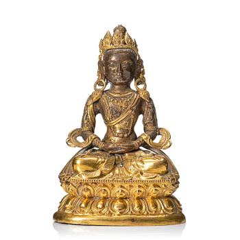 1101. A Mongolian, partly gilt reoussé sculpture of Amitayus, 19th Century.