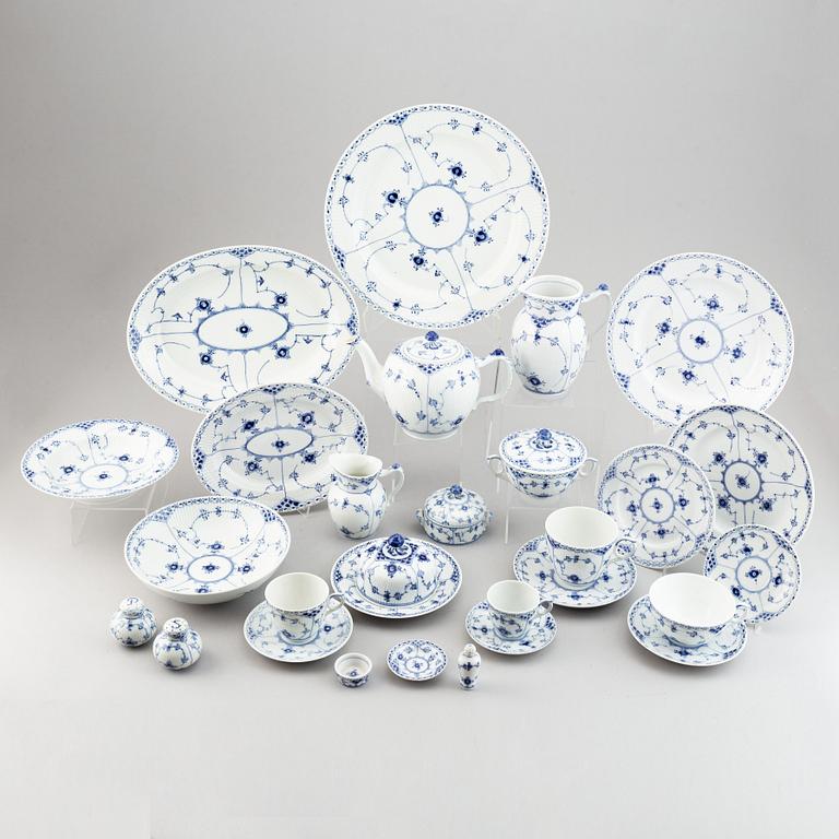 A 92 pcs half lace porcelain dinner-and coffee service, "Musselmalet" from Royal Copenhagen.