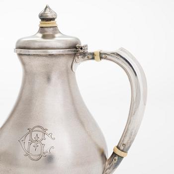 A four-piece silver coffee set, St. Petersburg 1887, original fitted box from Khlebnikov. Sugar tong, Moscow around 190.
