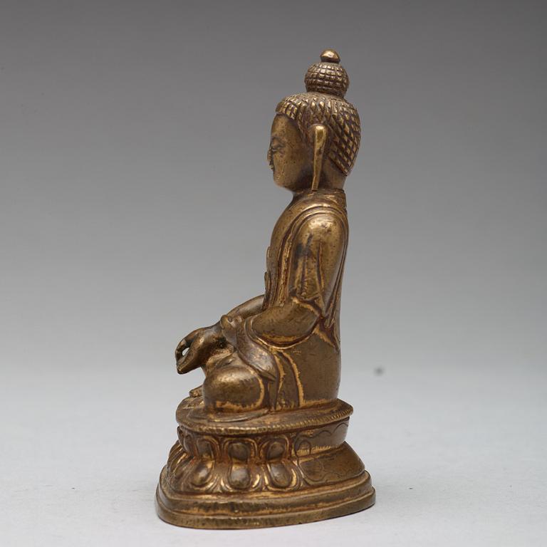 Two copper alloy figures of buddha, Sino-Tibetan, circa 1900.