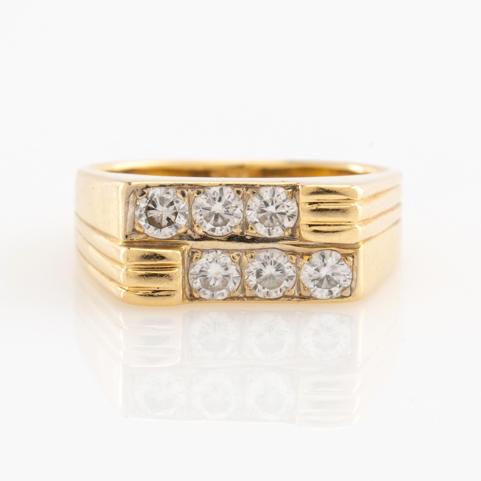 Ring, 18k gold with brilliant-cut diamonds, known as a "claw ring".