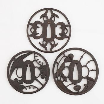 Three Japanese iron tsubas, probably 18th Century.