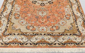 A part silk Tabriz carpet, so called 50 Raj, c 301 x 200 cm.