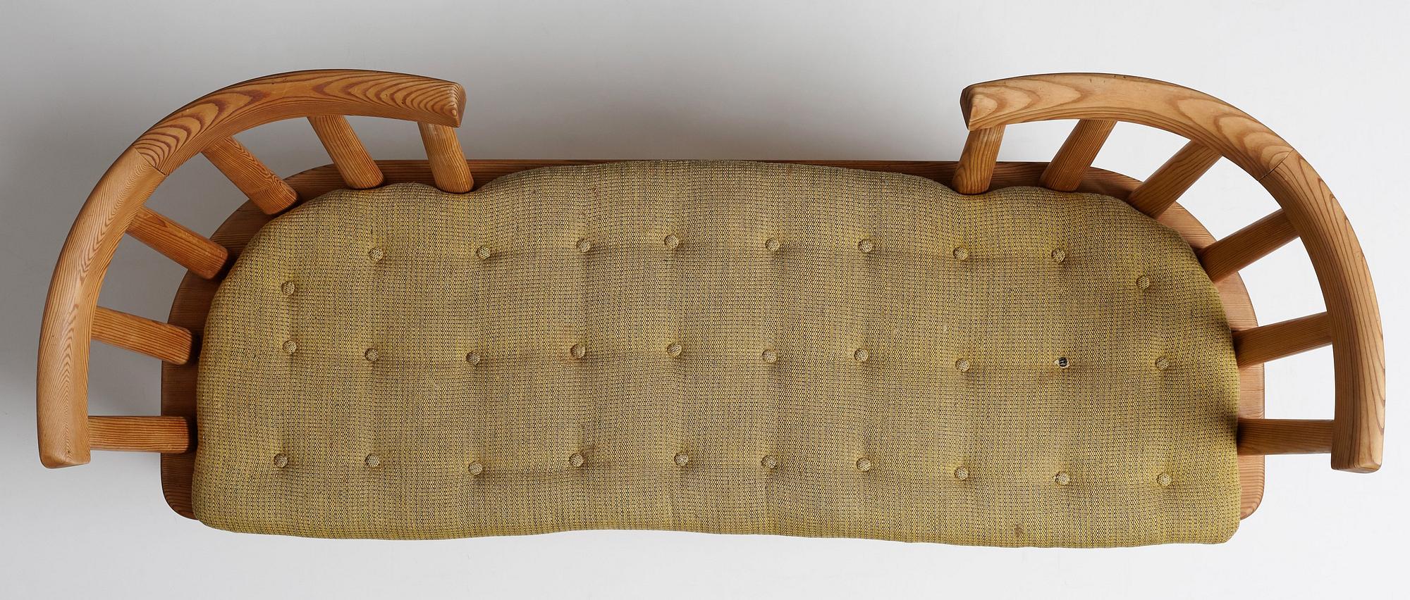 Axel Einar Hjorth, an "Utö" stained pine sofa, Nordiska Kompaniet, Sweden 1930's.