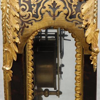 A French Boulle style mantel clock, 19th century.