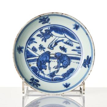 A blue and white 'floral' bowl and a dish, Ming dynasty, Jiajing (1522-1566).