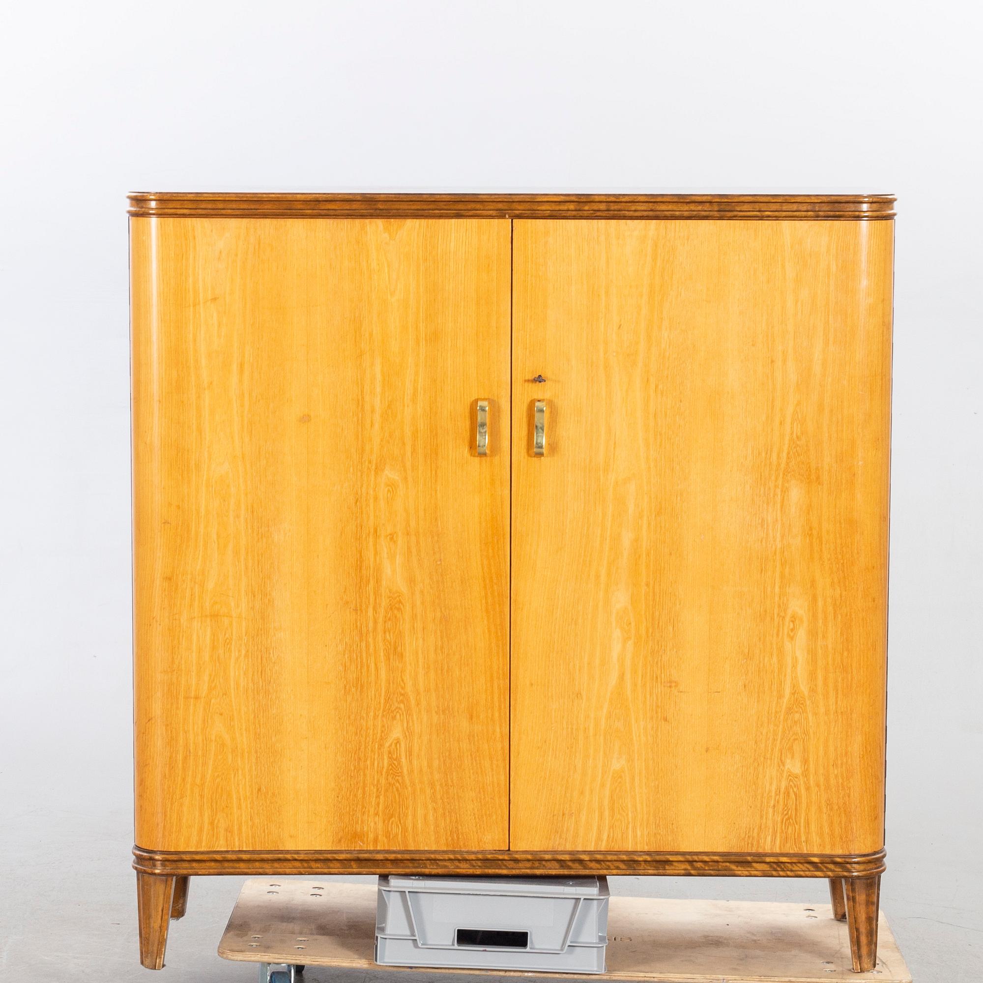 An 1940:s birch and beech cabinet 'Haga'.
