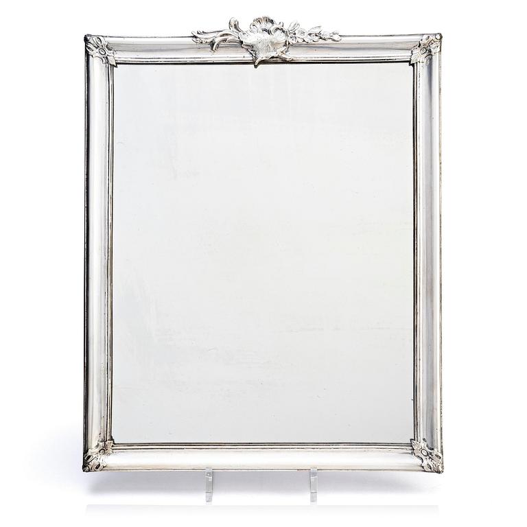 A Swedish Rococo mid-18th century mirror with silver frame  signed by Christian Precht.