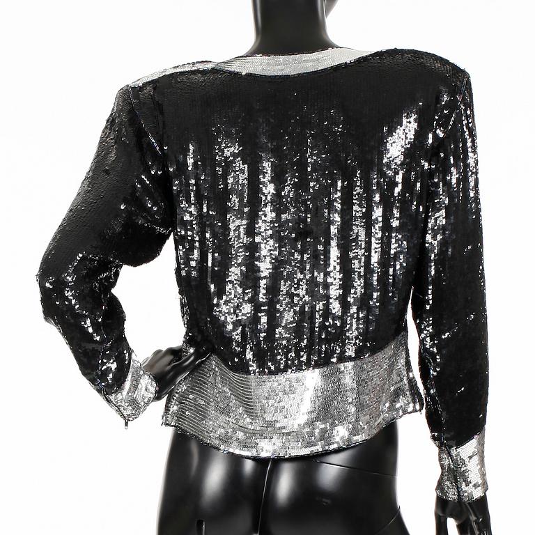 YVES SAINT LAURENT, top, 1985-86.