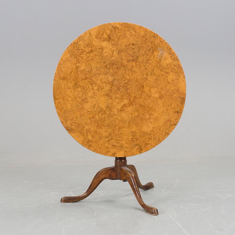 A early 1800's birch folding table.